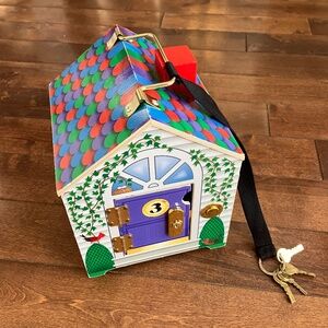 Melissa and Doug key House